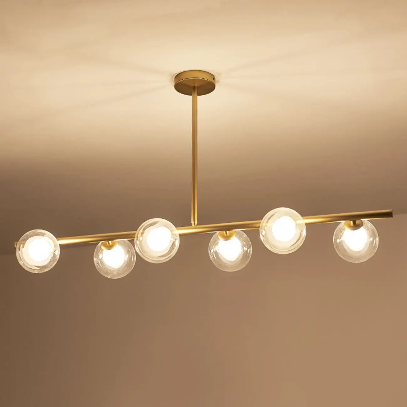 Gold Linear Island Light with 6 Lights Transparent Glass Globe Shades Image - 10 | homeyfad