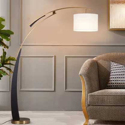 Modern Black Arced Floor Lamp with Fabric Shade and Gold Base Image - 1