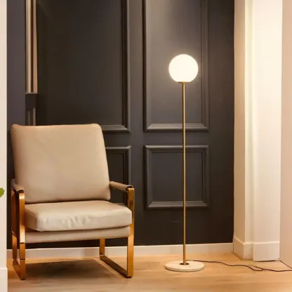 Minimalist Gold Floor Lamp with Glass Shade and Marble Base Image - 1