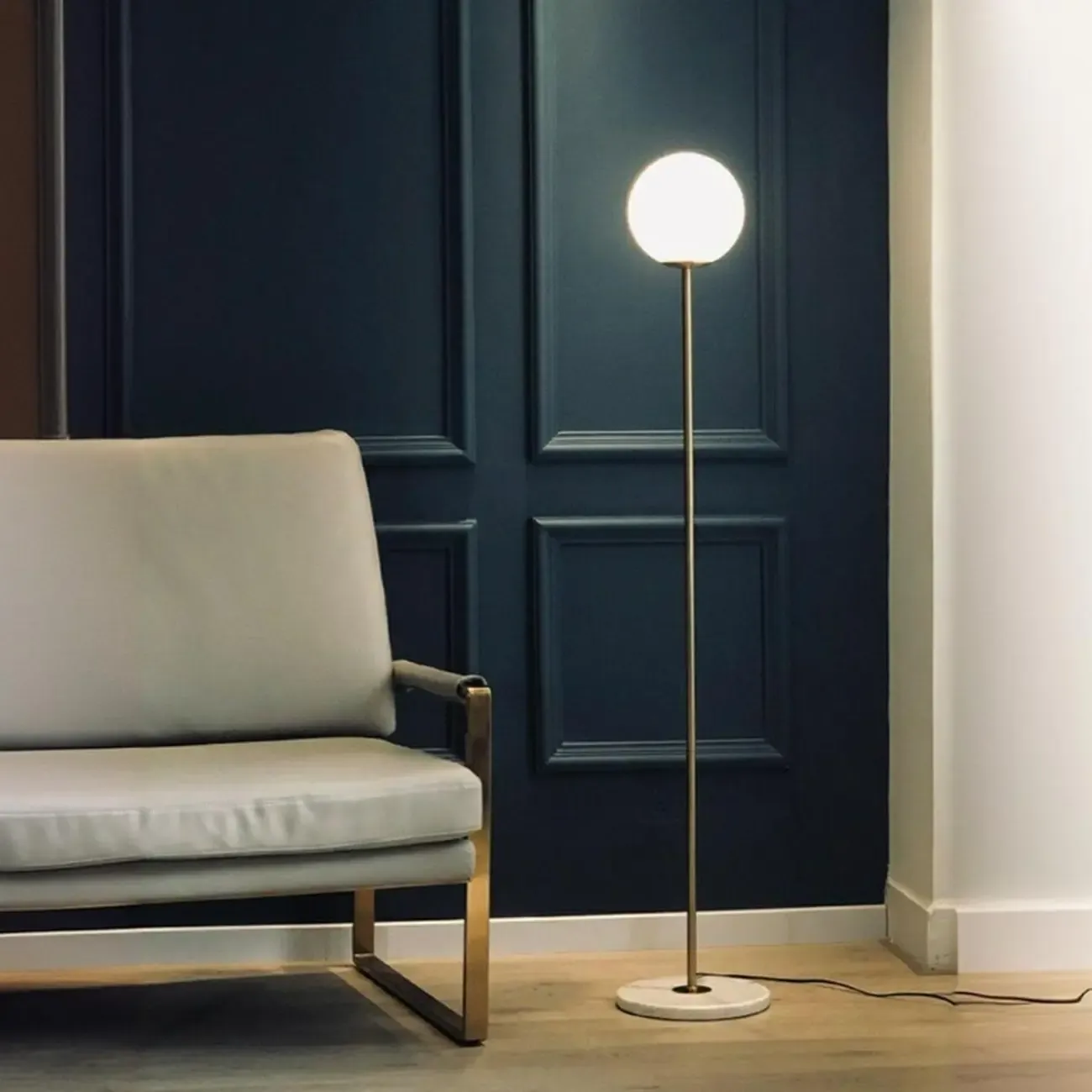 Minimalist Gold Floor Lamp with Glass Shade and Marble Base Image - 2