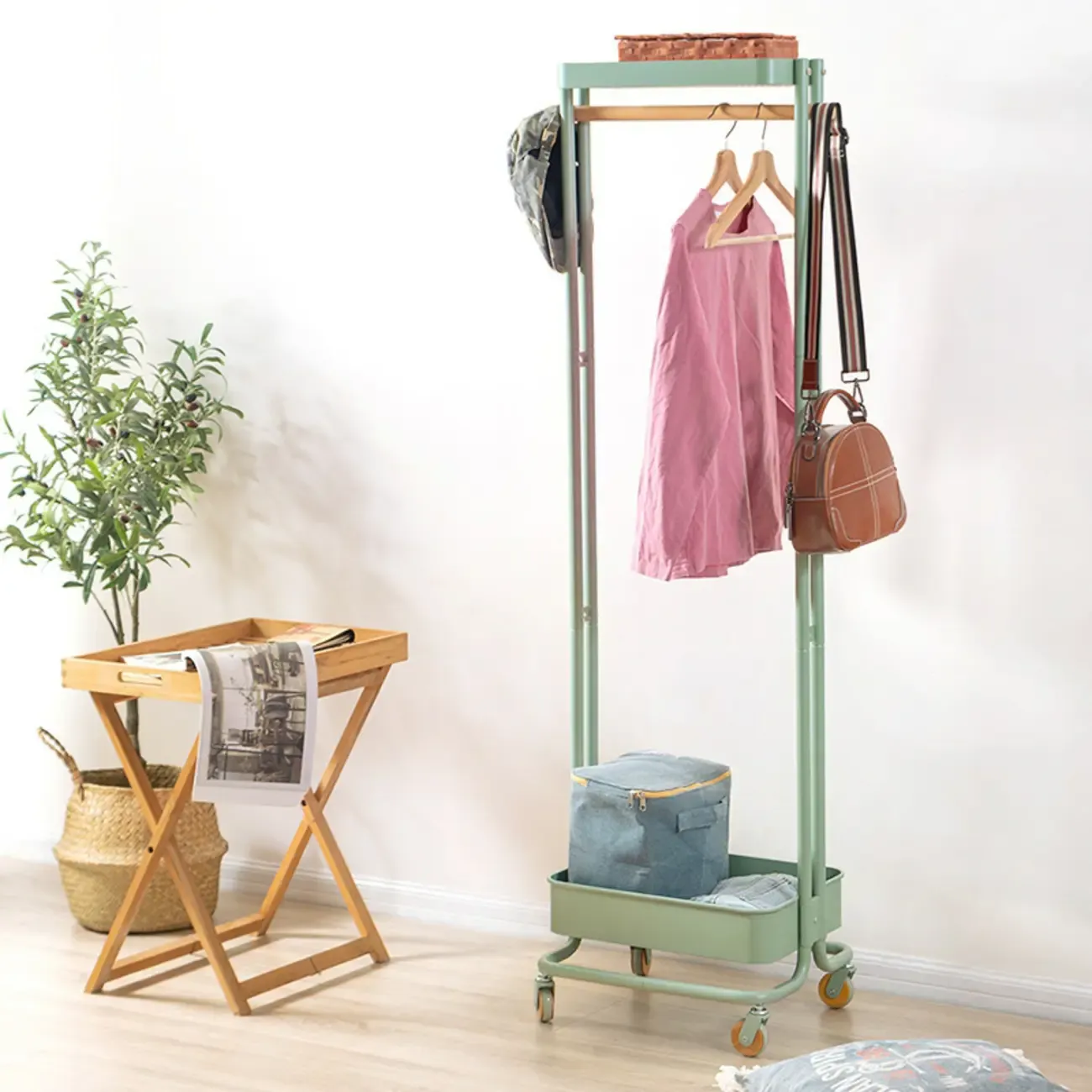 Modern Metal Coat Rack with Wheels and Basket Image - 6