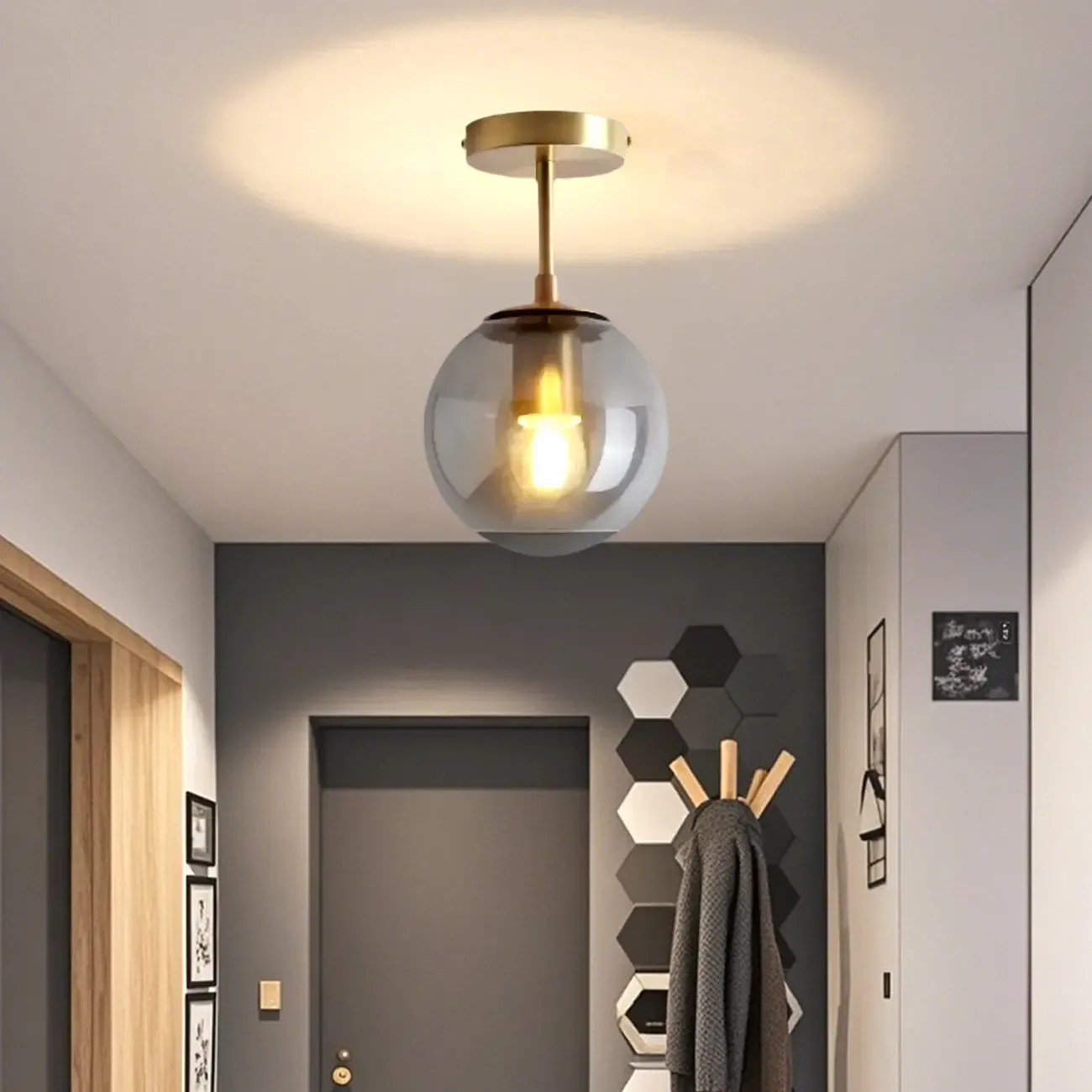 Minimalist Clear Globe Glass Metal Semi Flush Mount Light Image - 2