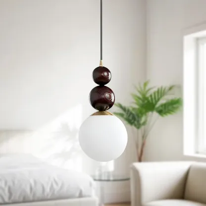 Modern White Glass Globe Pendant Light with Layered Black Bead Image - 4