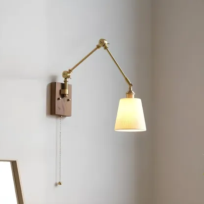 Antique Brass Swing Arm Wall Light with White Ceramics Shade Image - 1