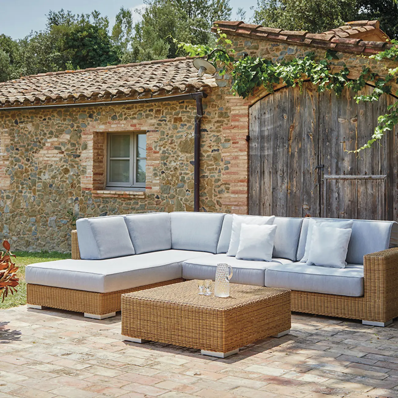 Tropical Rattan Outdoor Patio Sofa with White Cushions Image - 1 | homeyfad
