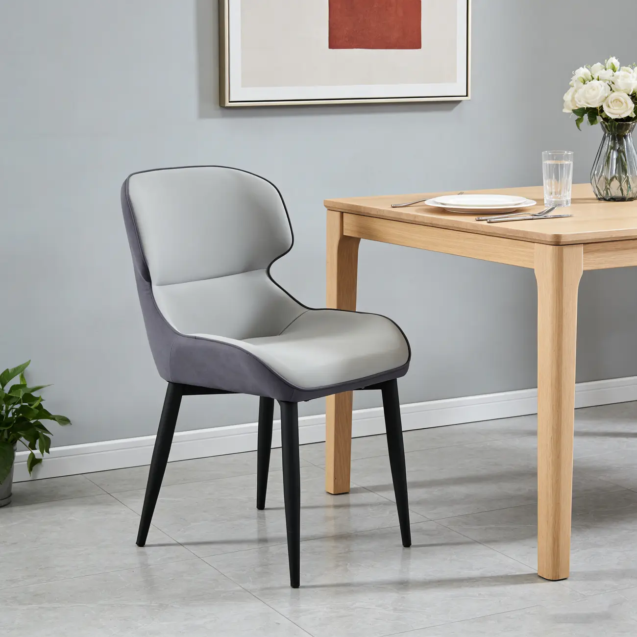 Scandinavian Leather Wingback Upholstered Dining Chair Image - 5 | homeyfad