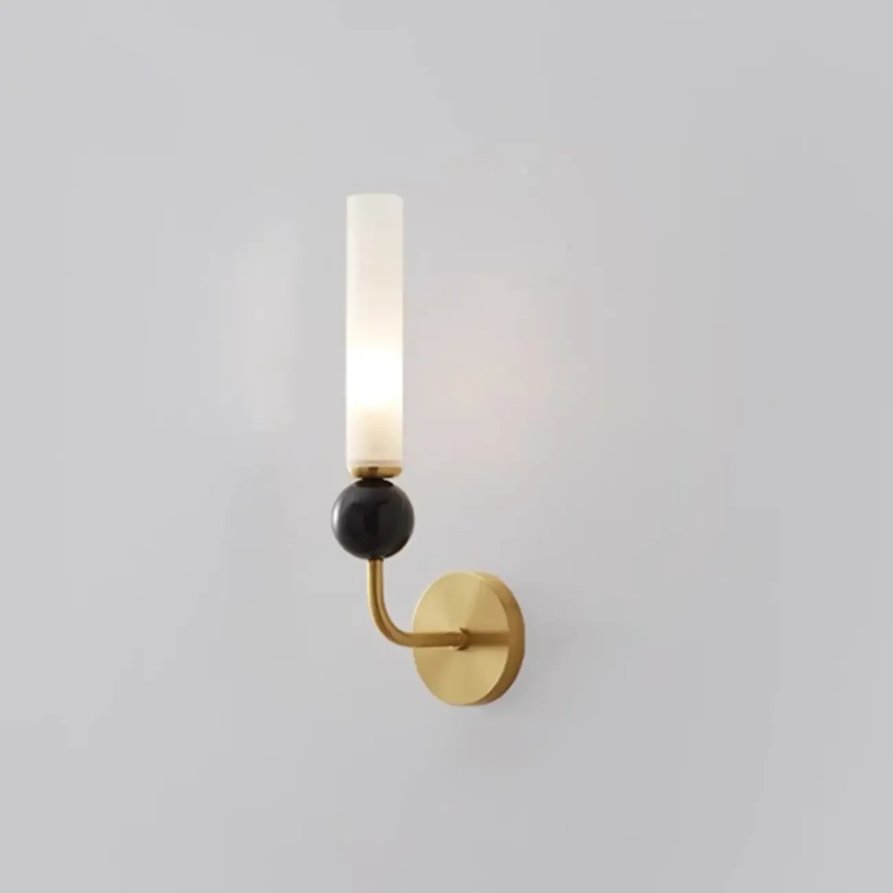 Minimalist Gold Wall Sconce with Sintered Stone Shade Image - 15