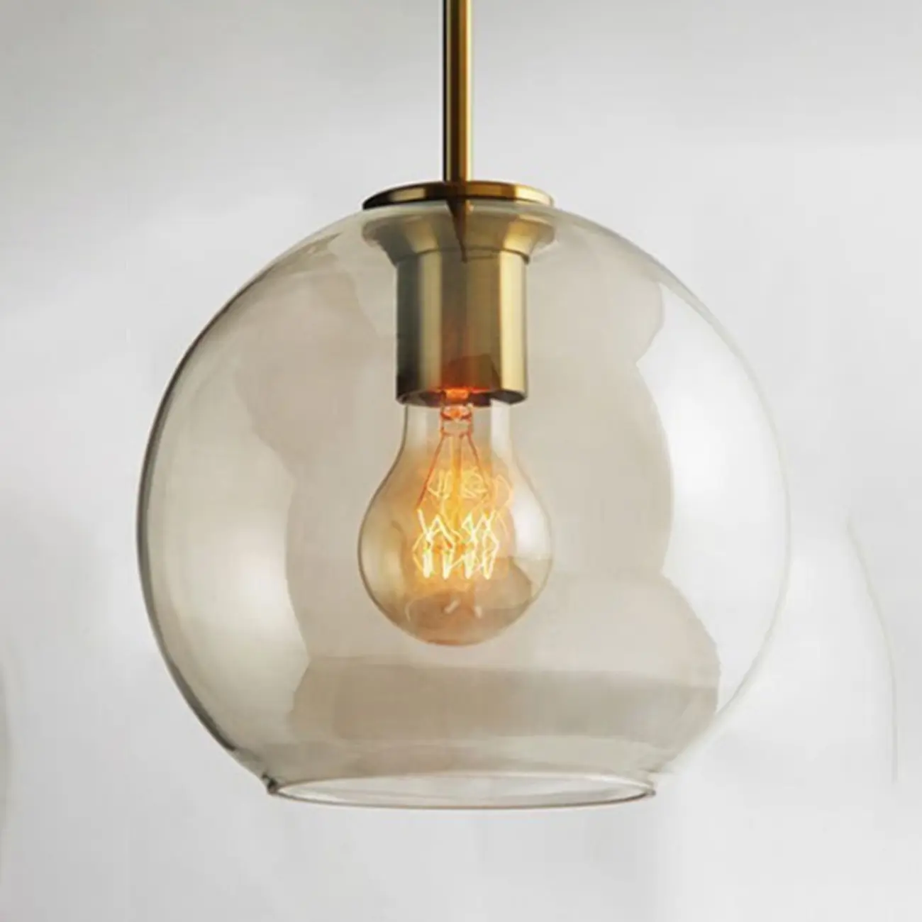 Simplistic Glass and Metal Cognac Globe Hanging Pendant Light  Image - 11 | homeyfad