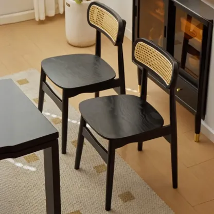 Rustic Black Wooden Armless Dining Chair with Handwoven Back Image - 1