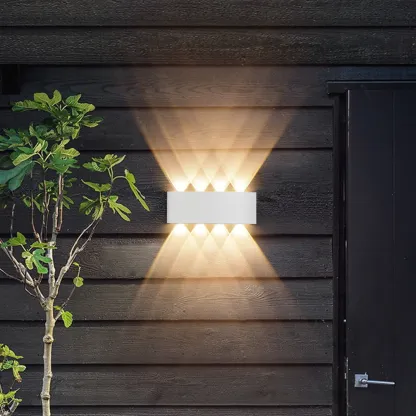 Subdued Light Up & Down Metal Wall Sconce Image - 2