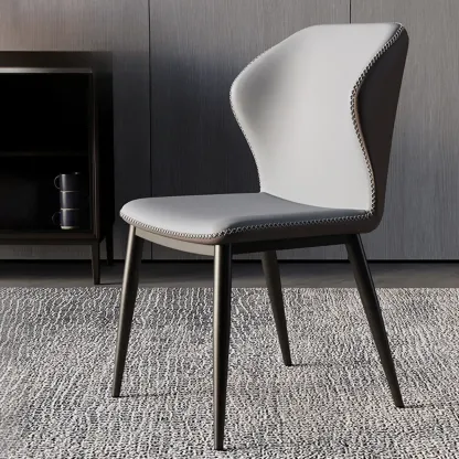 Scandinavian Faux Leather Wingback Dining Chairs Image - 5