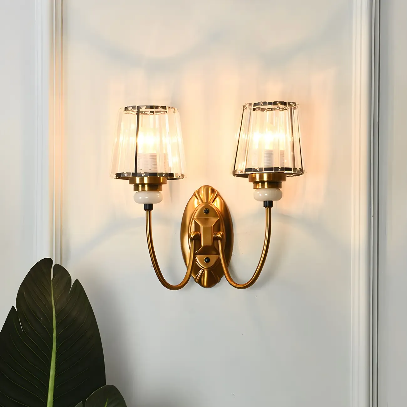 Elegant Brass Wall Sconce with Crystal Shade Image - 1