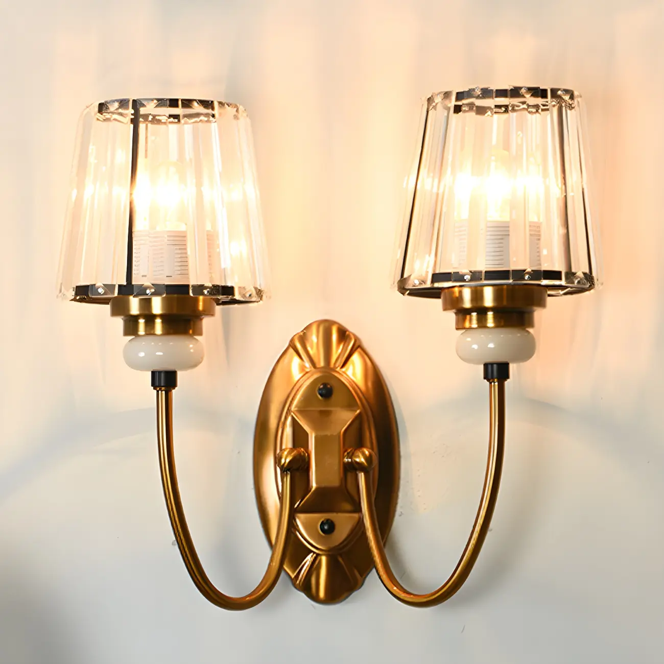 Elegant Brass Wall Sconce with Crystal Shade Image - 6 | homeyfad