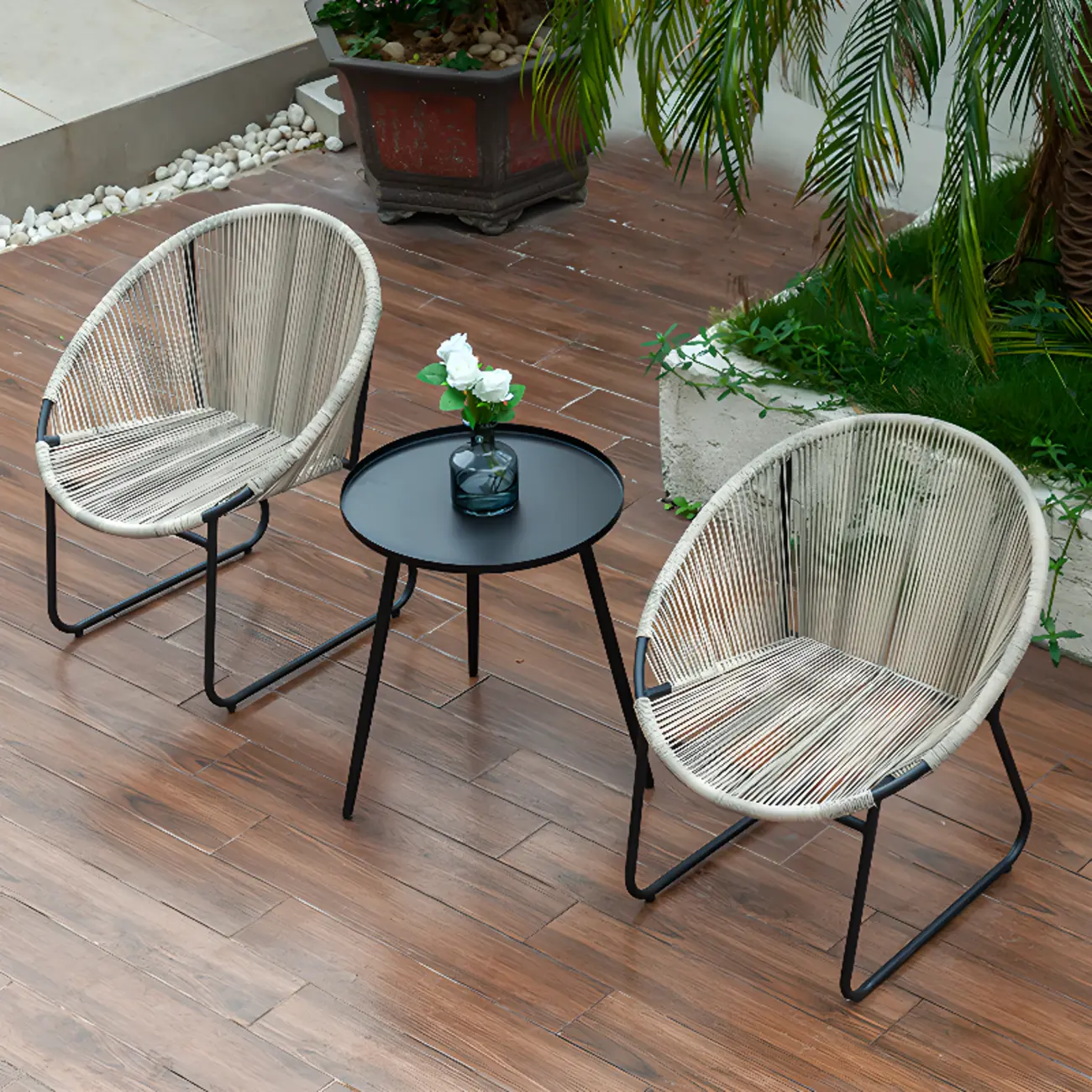 Woven Curved Black Steel Outdoor Dining Chairs Image - 1 | homeyfad