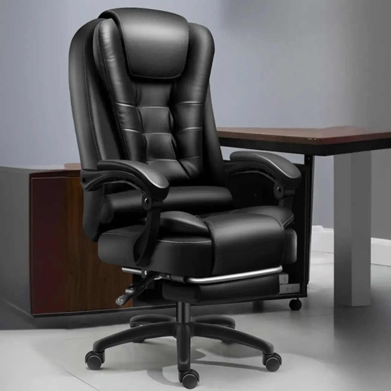 Ergonomic Black Leather Swivel Office Chair with Footrest Image - 11