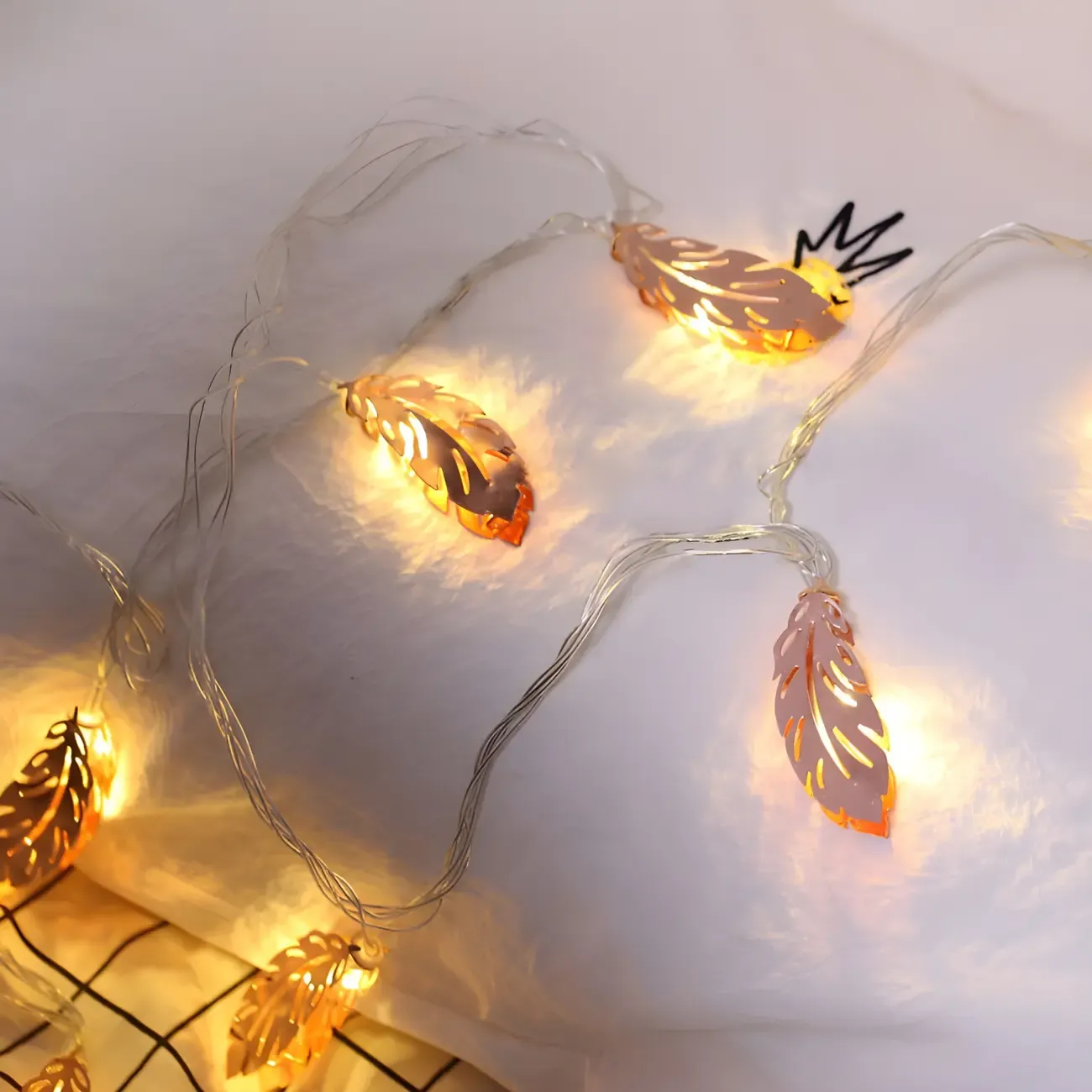 Elegant Rose Gold Metallic Feather Warm String Light Image - 3