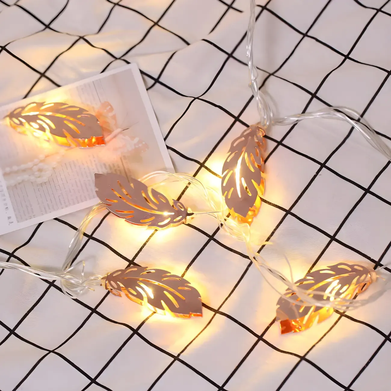 Elegant Rose Gold Metallic Feather Warm String Light Image - 5