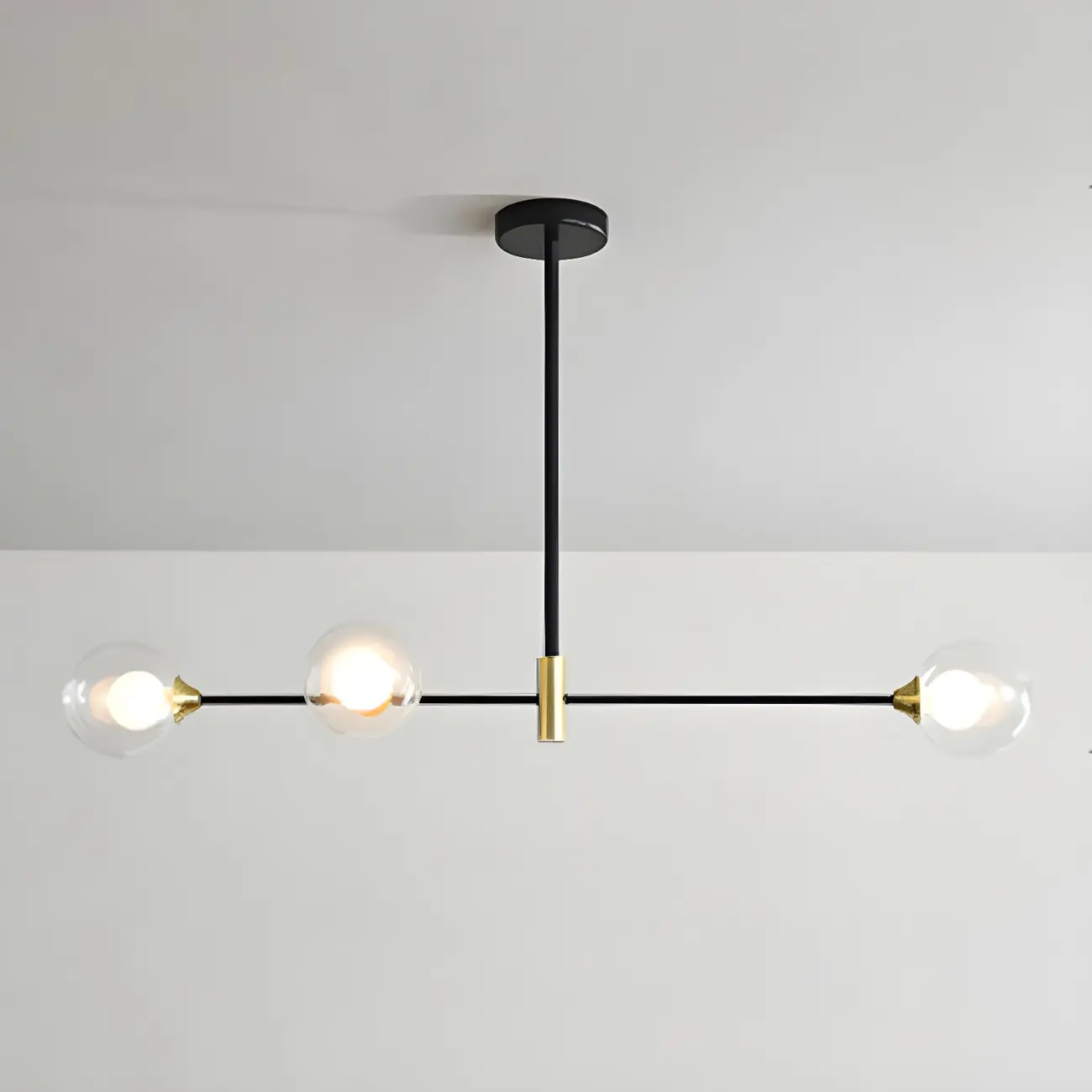 Sleek Black Metal Glass Globe Island Pendant Light Image - 5 | homeyfad