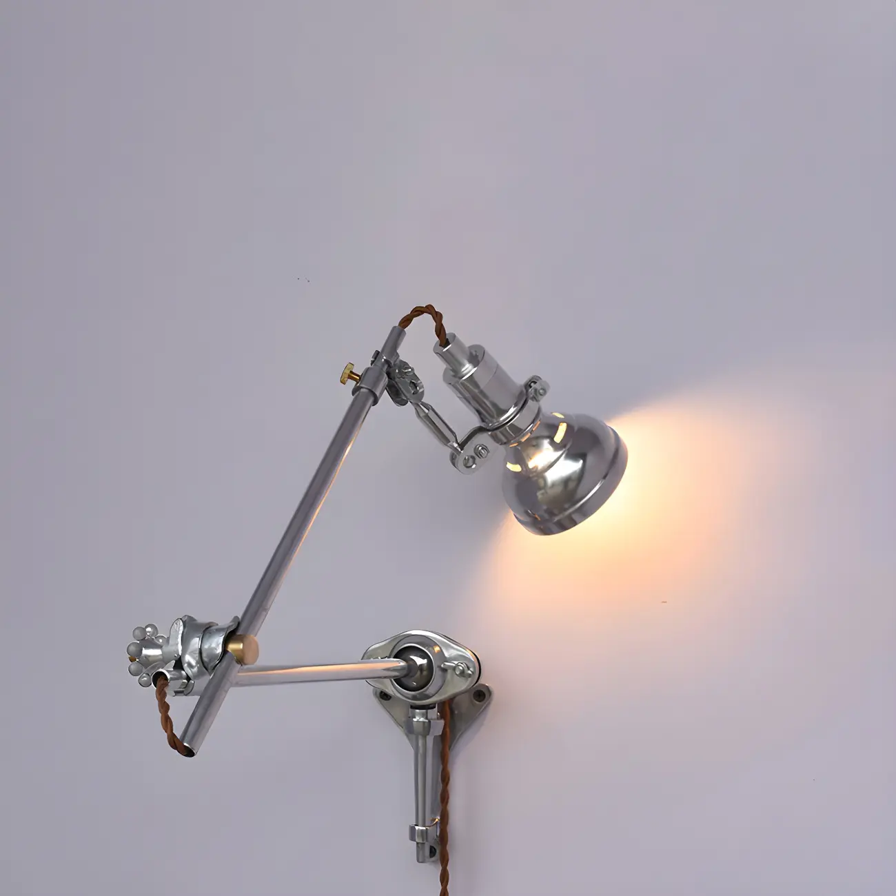 Modern Silver Geometric Wall Light with Adjustable Arm Image - 1 | homeyfad