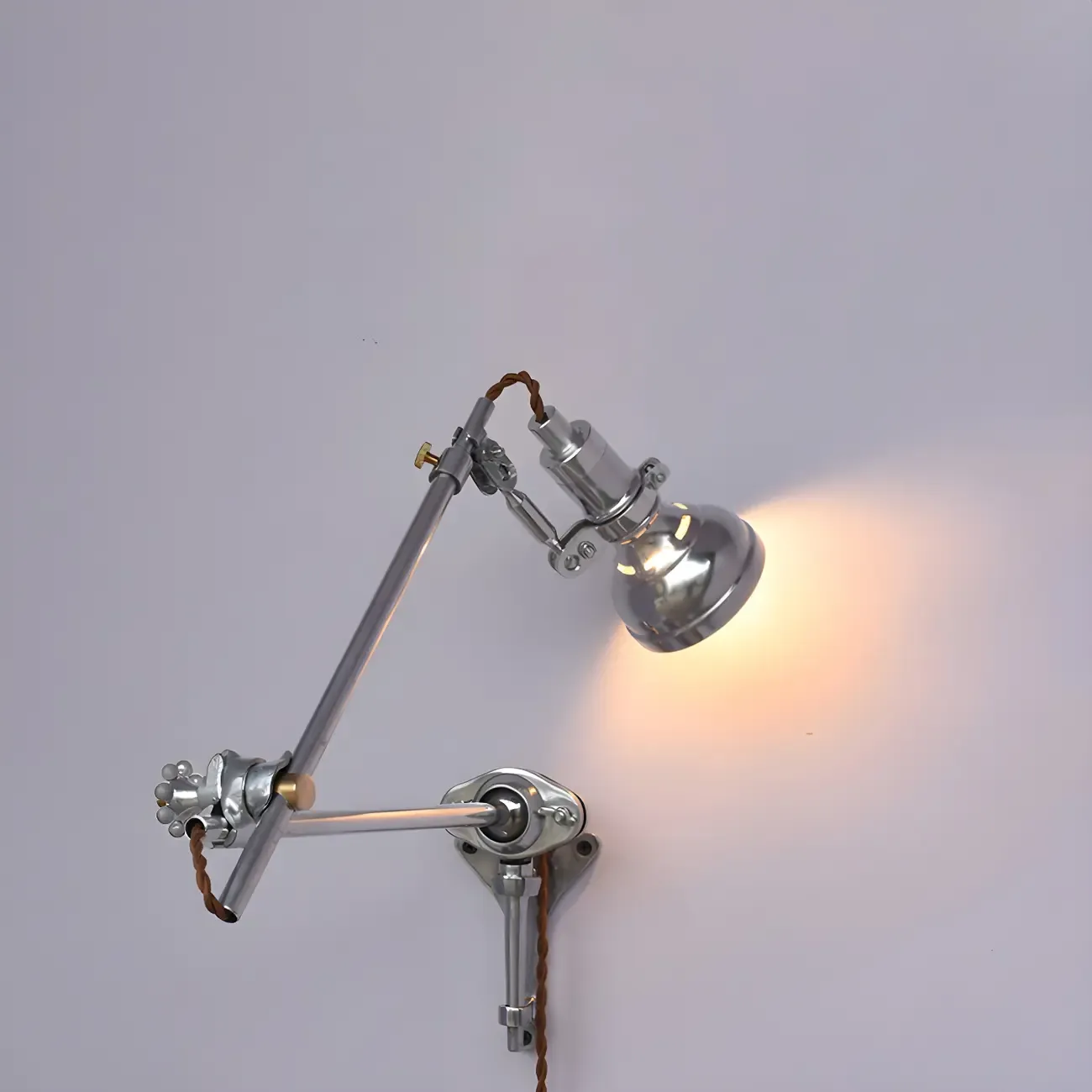 Modern Silver Geometric Wall Light with Adjustable Arm Image - 1