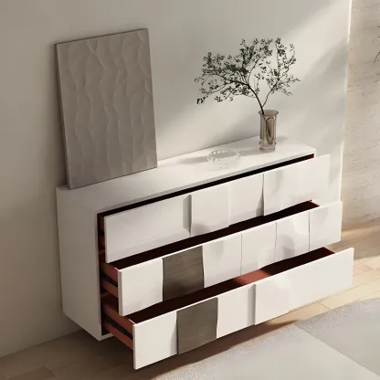 Unique White Wooden Dresser with Irregular Surface Image - 1