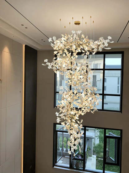 Artistic Tree Branch Pendant Light with Ceramic Ginkgo Leaves