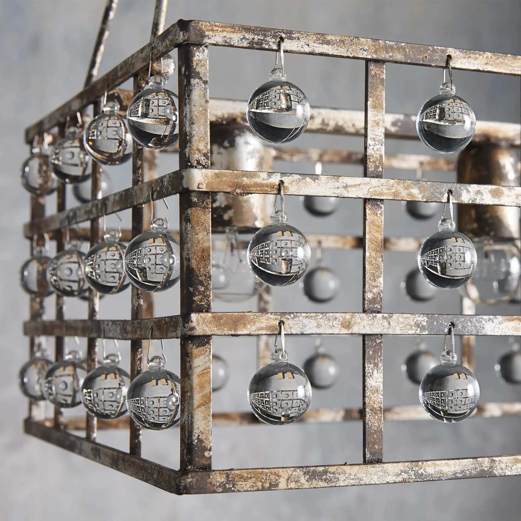 https://cdn.shopify.com/s/files/1/0618/9567/1984/files/fanci-la-cage-rectangular-chandelier-7-light-6.webp?v=1765944690