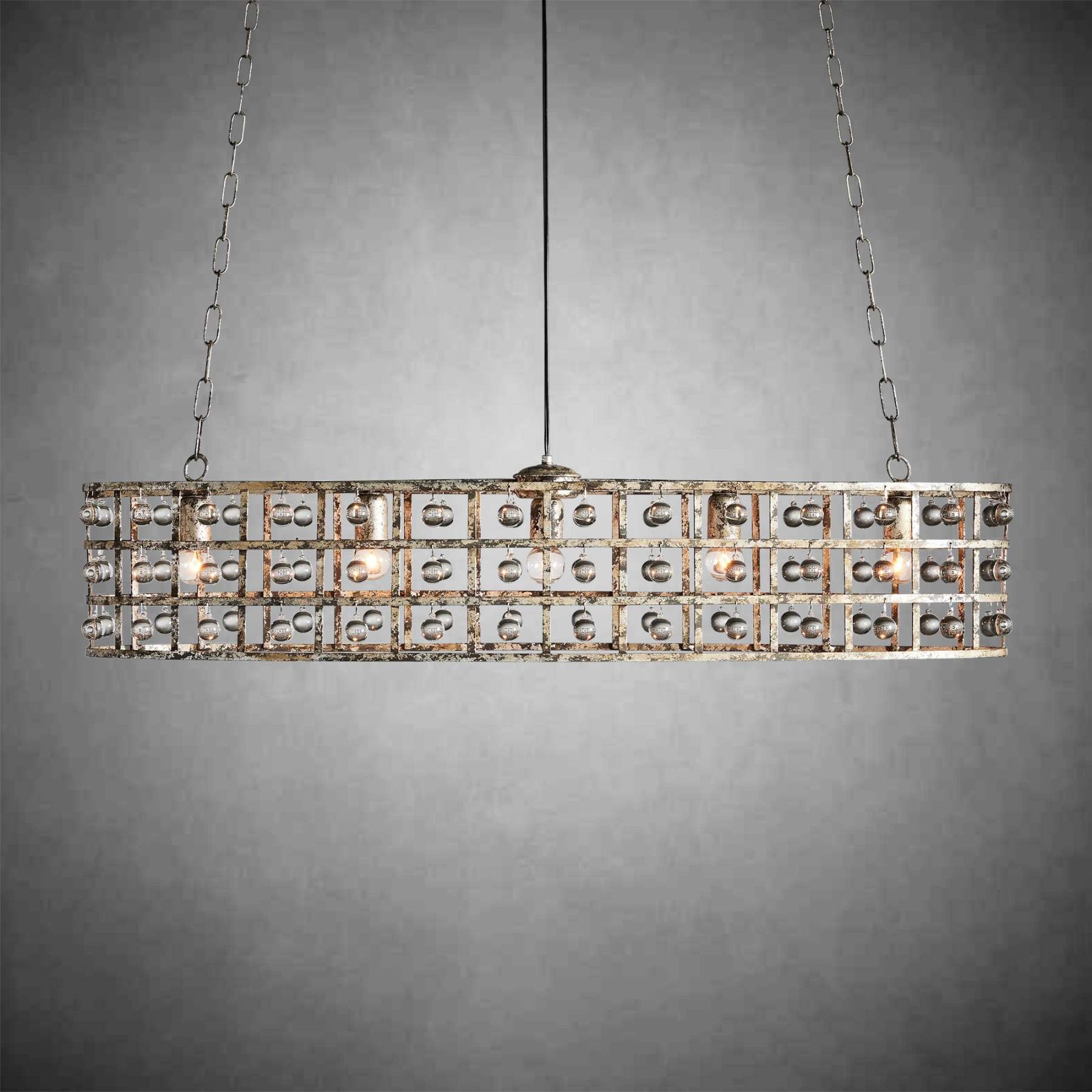 https://cdn.shopify.com/s/files/1/0618/9567/1984/files/fanci-lighting-la-cage-oval-chandelier-5-light-2.jpg?v=1765964200