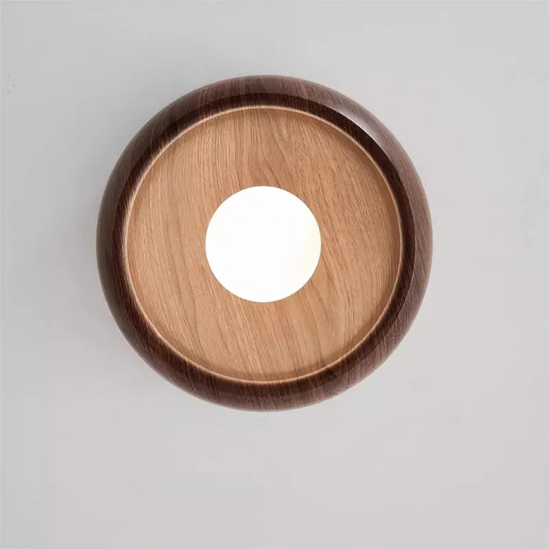 Muto round wood ceiling light fixture, illuminated.