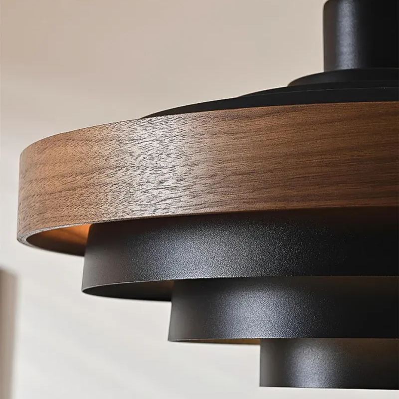 Muto pendant light detail: wood and metal ring design