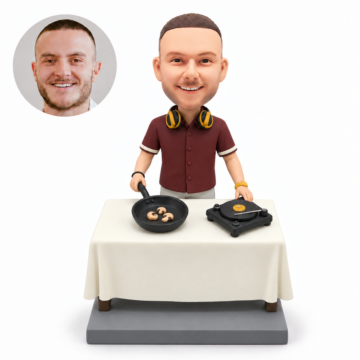 custom bobblehead figure male dj chef with a frying pan and a turntable on a cooking counter