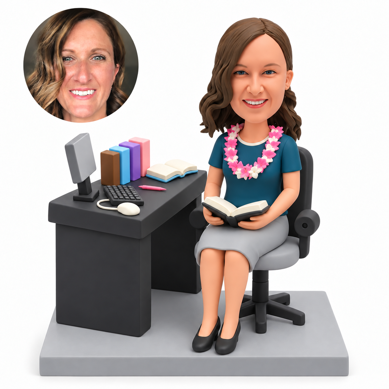 custom bobblehead figure female teacher seated beside a computer desk holding an open book on her lap