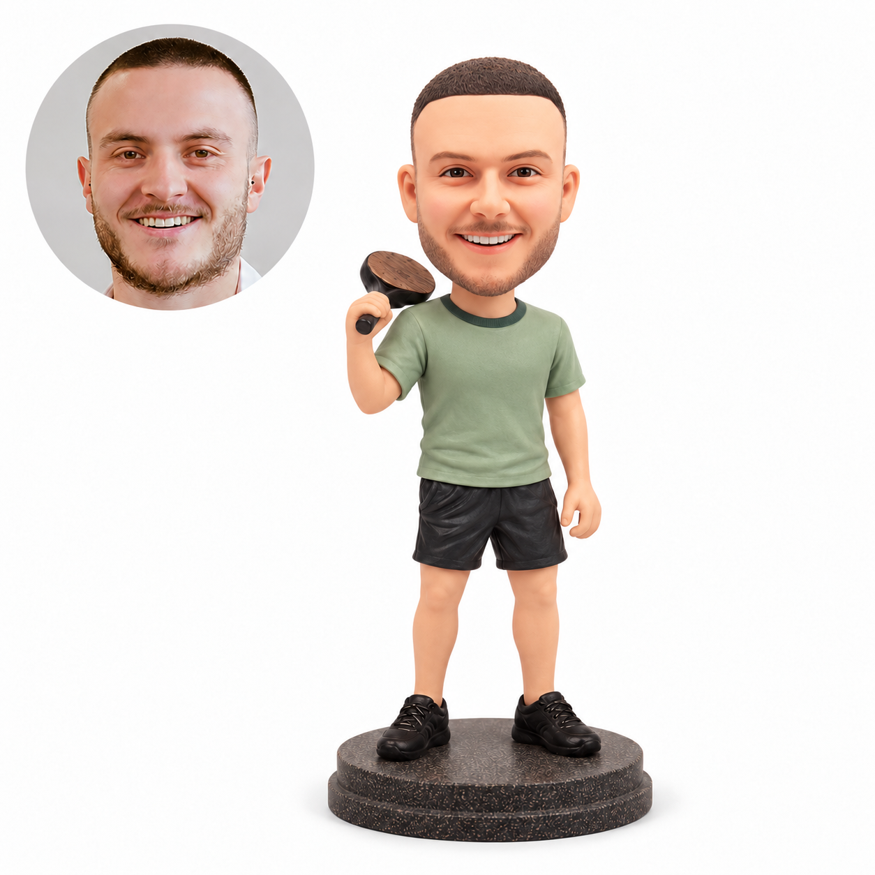 custom bobblehead figure man resting a table tennis paddle over his right shoulder