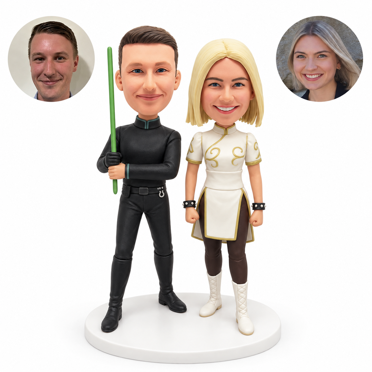 Custom clay fantasy couple bobbleheads: man holding an upright green staff, woman in an ivory short tunic, with matching portrait photos