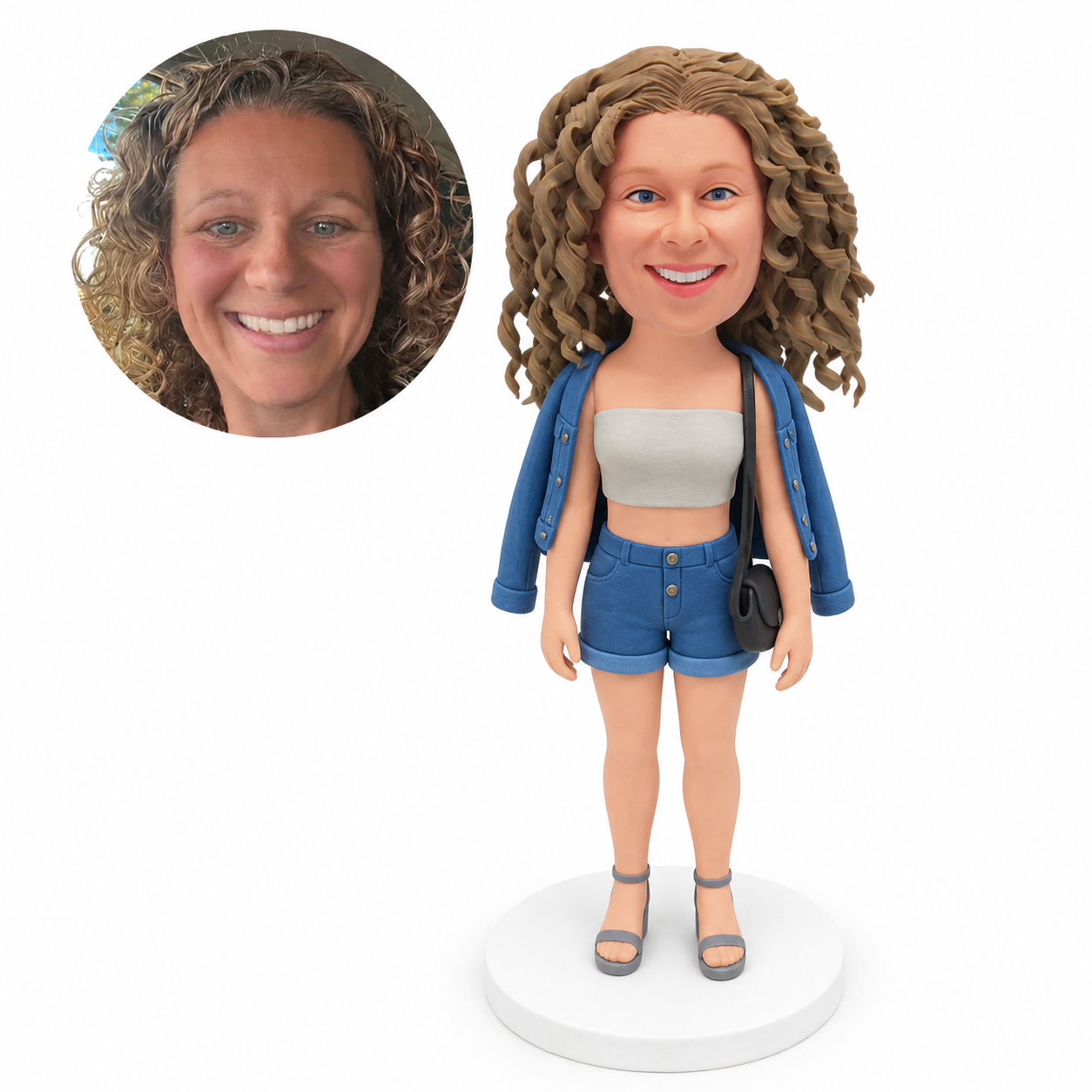 custom bobblehead figure woman in a cape-draped denim jacket and shorts with a shoulder bag