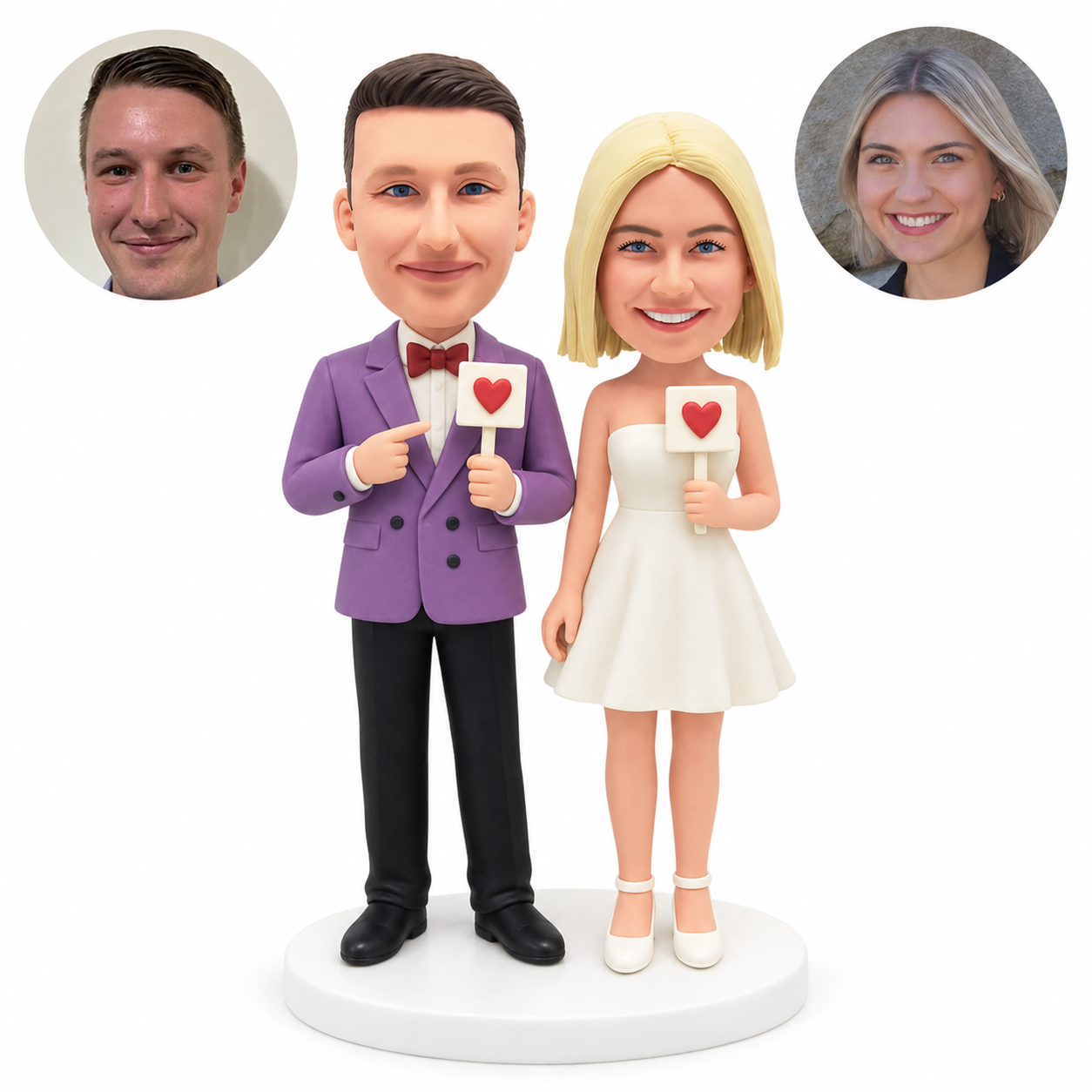 custom bobblehead figures formal couple each holding a small heart sign
