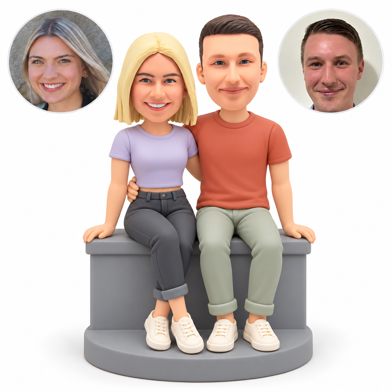 custom bobbleheads figures couple sitting on a low wall with their inner arms around each others waist