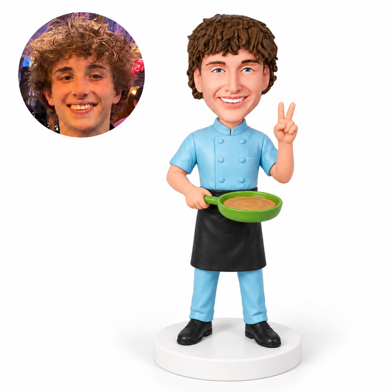 custom bobblehead figure male chef holding a frying pan and making a peace sign