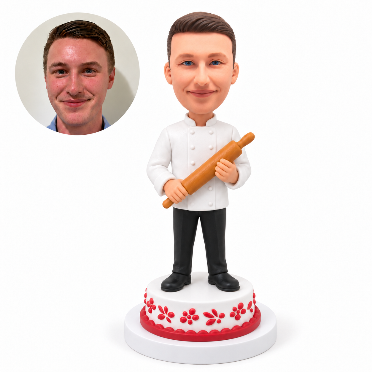 custom bobblehead figure male baker holding a rolling pin on a cake pedestal