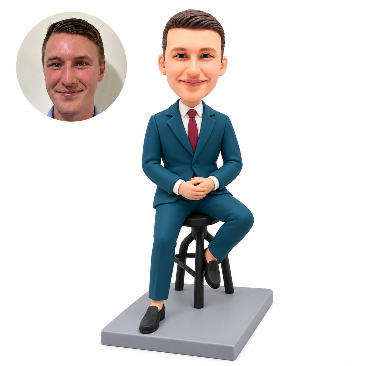 custom bobblehead figure male in a suit seated on a high stool with hands joined in his lap