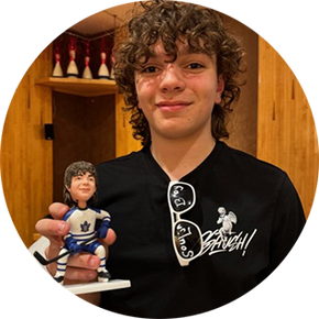 Lina Vickers customer photo with a custom bobblehead.