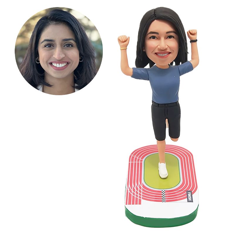 personalized bobble head figure female runner with hands up on the playground