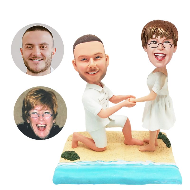 personalised bobble head proposal couple on beach