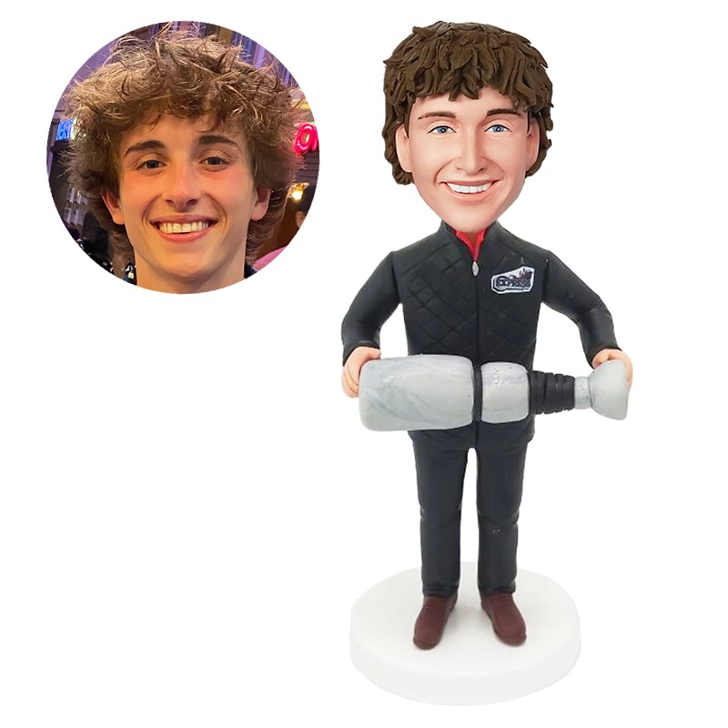 personalized bobblehead male coach holding a trophy