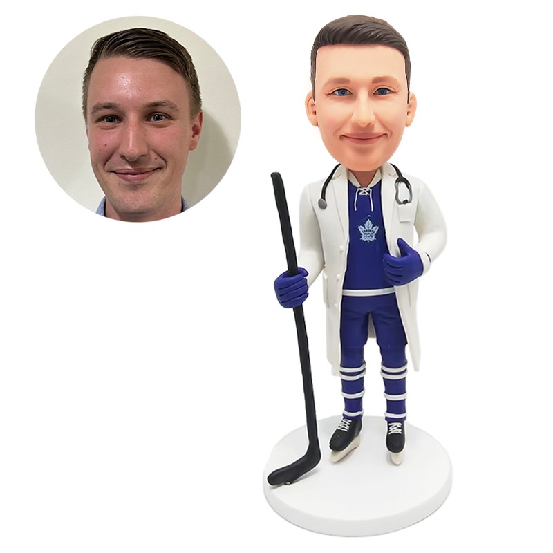 bobblehead custom male surgeon doctor holding a hockey stick