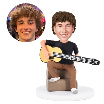 personalised bobble head musician holding a guitar