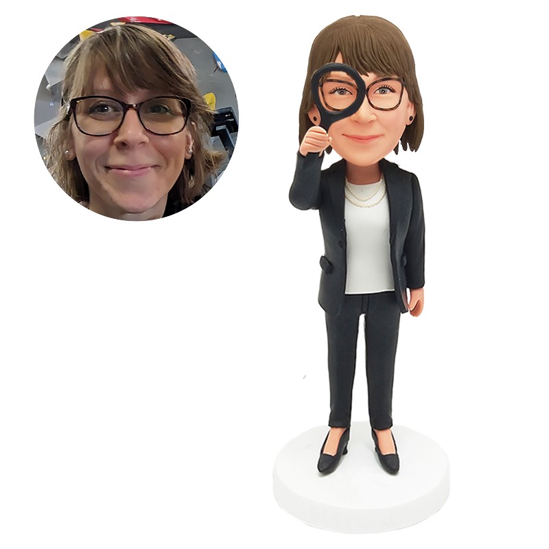 personalised bobble head female scientist with a magnifying glass
