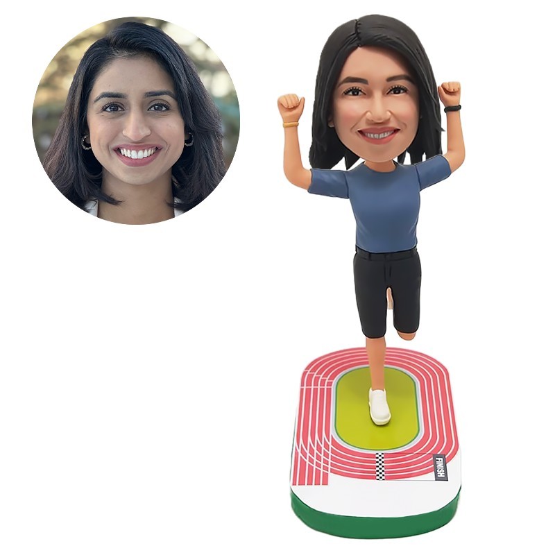 custom bobblehead female runner with hands up on the playground