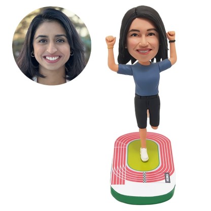 custom bobblehead female runner with hands up on the playground