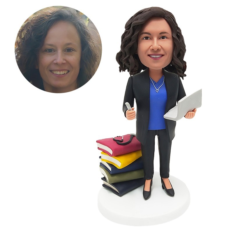 personalized bobblehead teacher with pile of books